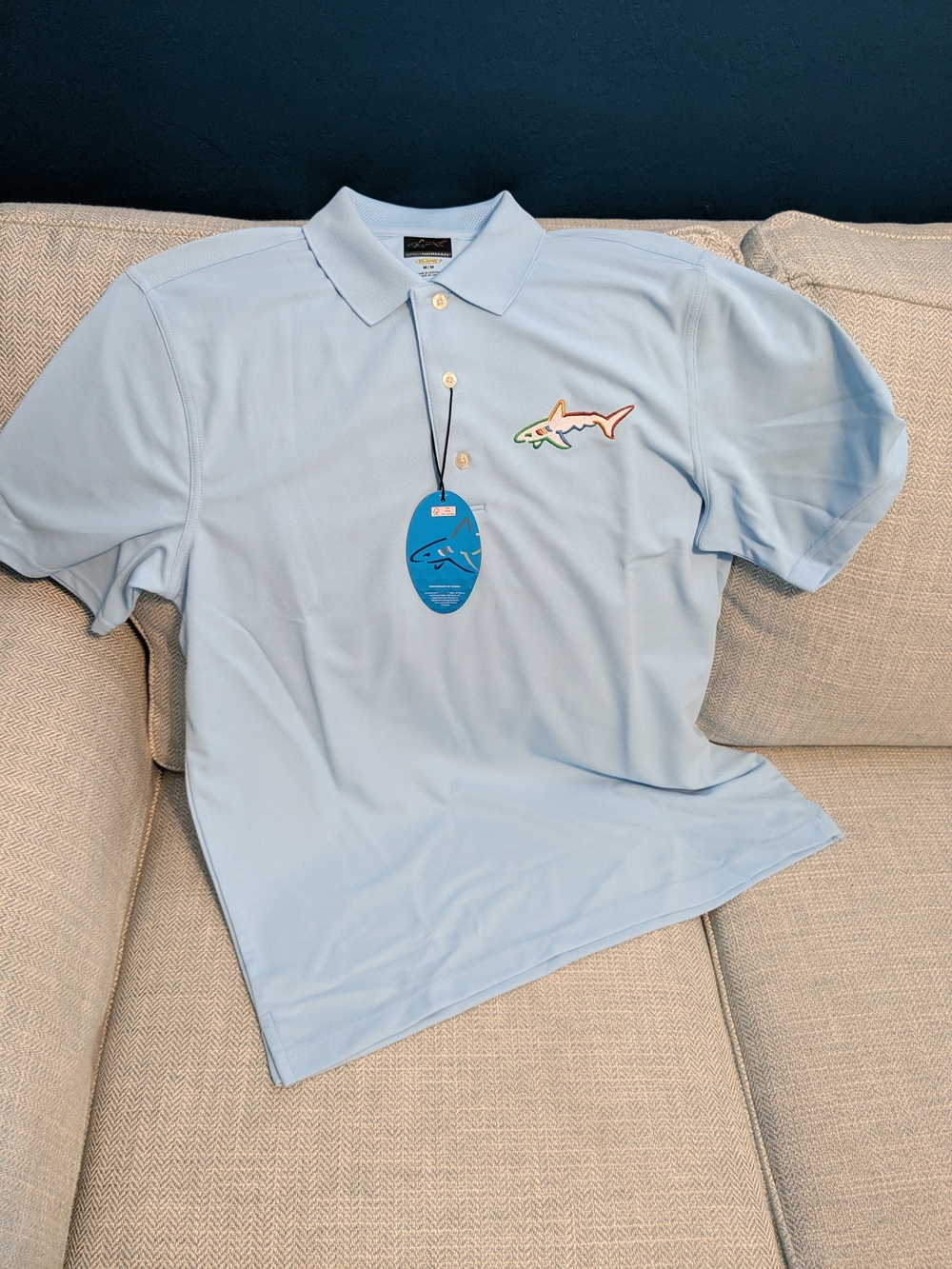 Greg Norman Collection Men's Light Blue Performance Polo with Shark Logo - Picture 2 of 3